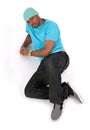 Young man in a blue t-shirt lying down thinking Royalty Free Stock Photo