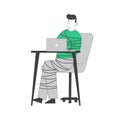 Young Man Bounded with Rope Sitting at Desk Working on Laptop. Social Media and Gadget Addiction Concept Royalty Free Stock Photo