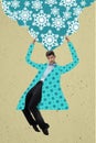 Young man in bright coat holds a snowdrift overhead isolated on light background. Contemporary art collage. Royalty Free Stock Photo