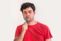 Young man brushing teeth in the morning Royalty Free Stock Photo