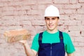 Young man in a builder uniform.