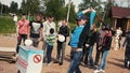 Young man bump with force on sensitive inflatable stand by maul. Summer festival