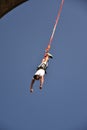 Young man bungee jumper hanging on a cord Royalty Free Stock Photo