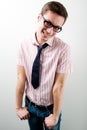 Young man in business casual clothing in glasses smiling over white background Royalty Free Stock Photo