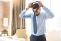 Young man business traveler hotel room accomodation Royalty Free Stock Photo