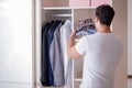 The young man businessman getting dressed for work Royalty Free Stock Photo