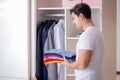 The young man businessman getting dressed for work Royalty Free Stock Photo