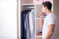 The young man businessman getting dressed for work Royalty Free Stock Photo