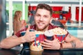 Young man buying popcorn and coke Royalty Free Stock Photo