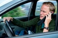 Young man is calling in the car Royalty Free Stock Photo