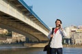 Young man calling by mobile phone outdoors Royalty Free Stock Photo