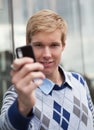 Young man with cameraphone Royalty Free Stock Photo