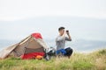 Young Man On Camping Trip In Countryside Royalty Free Stock Photo