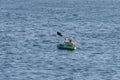 Young man canoeing in the sea Royalty Free Stock Photo