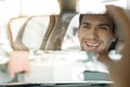 Young Man in a Car Rental Service Test Drive Concept Royalty Free Stock Photo