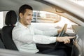 Young Man in a Car Rental Service Test Drive Concept Royalty Free Stock Photo