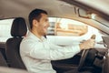 Young Man in a Car Rental Service Test Drive Concept Royalty Free Stock Photo