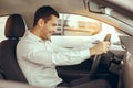 Young Man in a Car Rental Service Test Drive Concept Royalty Free Stock Photo