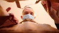 Young Man Carefully Opens Box Delivery from Online Store, Coronavirus Quarantine Royalty Free Stock Photo