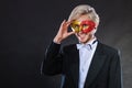 Young man in carnival mask on dark Royalty Free Stock Photo