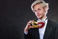 Young man in carnival mask on dark Royalty Free Stock Photo