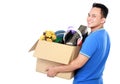 Young man carrying box full of stuff Royalty Free Stock Photo