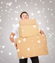 Young man carrying carton boxes Royalty Free Stock Photo