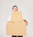 Young man carrying carton boxes Royalty Free Stock Photo