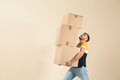 Young man carrying carton boxes Royalty Free Stock Photo