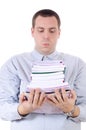 Young man carrying a stack of books Royalty Free Stock Photo
