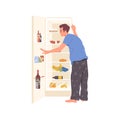 Young man cartoon character in pajamas searching for night snack looking at opened refrigerator Royalty Free Stock Photo