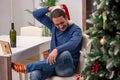 Young man celebrating Christmas alone at home Royalty Free Stock Photo