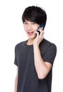 Young Man chat on mobile phone Royalty Free Stock Photo