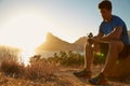 Young man checking his sports watch Royalty Free Stock Photo