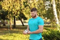 Young man checking pulse after workout Royalty Free Stock Photo