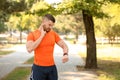Young man checking pulse after workout Royalty Free Stock Photo