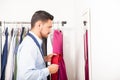 Young man choosing the right tie Royalty Free Stock Photo