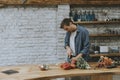 Young man chopping vegetables in the kitchen and preparing healthy meal Royalty Free Stock Photo