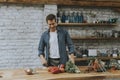 Young man chopping vegetables in the kitchen and preparing healthy meal Royalty Free Stock Photo