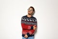 Young man in Christmas sweater with party glasses Royalty Free Stock Photo