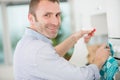 young man cleaning inside at home kitchen Royalty Free Stock Photo