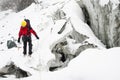 A young man climber traverse a crevasse