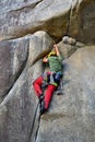 Young man is climbing crack in the rock in Squamish. Royalty Free Stock Photo