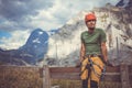 Young man climbing on a rock in Swiss Alps Royalty Free Stock Photo