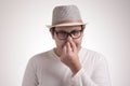 Young Man Close His Nose, Smells Something Bad Royalty Free Stock Photo