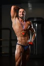 Young Man Competitor Showing His Winning Medal Royalty Free Stock Photo