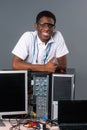 Young man and computers Royalty Free Stock Photo