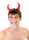 Young Man with Condom Royalty Free Stock Photo