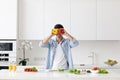 Young man cooking in modern kitchen, preparing breakfast Royalty Free Stock Photo