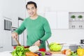 Young man cooking vegetable Royalty Free Stock Photo